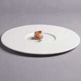 Assiette Céramique Blanche Centro Maison Deleurde, vue rapprochée de la forme et de la finition