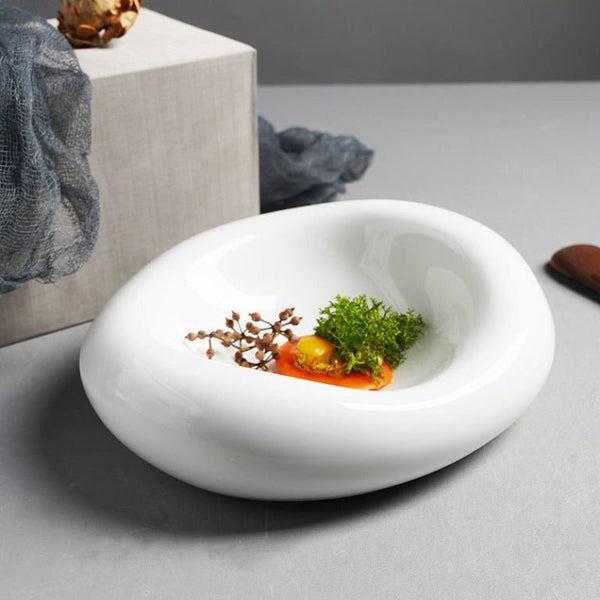 Assiette Céramique Ovale Bubble Maison Deleurde avec dressage gastronomique