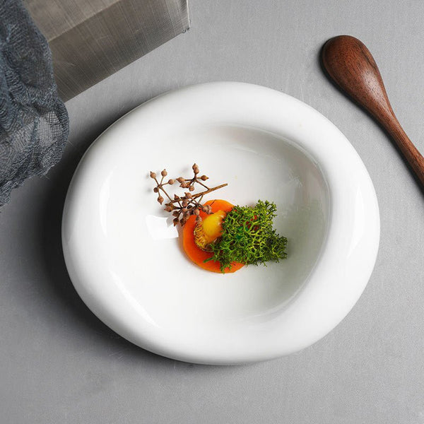Assiette Céramique Ovale Bubble Maison Deleurde avec dressage gastronomique